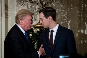 President Donald Trump talks with White House Senior Adviser Jared Kushner as they attend a Hanukkah reception in the East Room of the White House, Dec. 7, 2017. (Credit: Drew Angerer / Getty Images)