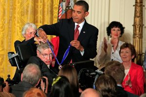 U.S. President Barack Obama presents the Medal of Freedom to physicist Stephen Hawking during a ceremony in the East Room of the White House Aug. 12, 2009 in Washington, D.C. (Credit: Chip Somodevilla/Getty Images)