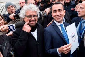 Five Star Movement leader Luigi Di Maio, right, poses with movement founder Beppe Grillo outside the Interior Ministry on Jan. 19, 2018 after they registered their logo for the upcoming general elections to be held on March 4, 2018. (Credit: ANDREAS SOLARO/AFP/Getty Images)