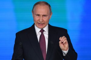 Russian President Vladimir Putin addresses the Federal Assembly at Moscow's Manezh exhibition centre on March 01, 2018. (Credit: YURI KADOBNOV/AFP/Getty Images)