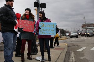 Supporters and school employees strike for West Virginia teachers on March 2, 2018, in Morgantown, West Virginia, as the public school educators demonstrate in the name of better pay labor policies. (Credit: Spencer Platt/Getty Images)