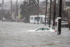 A flooded car sits in Hough's Neck due to a strong coastal storm on March 2, 2018 in Quincy, Massachusetts. (Credit: Scott Eisen/Getty Images)
