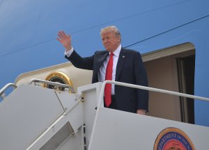 President Donald Trump steps off Air Force One upon arrival at Marine Corps Air Station Miramar in San Diego on March 13, 2018. (Credit: MANDEL NGAN / AFP / Getty Images)