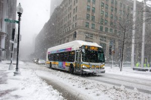 An MBTA bus makes it way down Stuart Street as Winter Storm Skylar bears down on March 13, 2018 in Boston, Mass. It was the third nor'easter to hit the area in less than two weeks. (Credit: Scott Eisen/Getty Images)