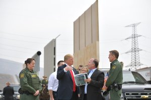 President Donald Trump inspects border wall prototypes in San Diego on March 13, 2018. (Credit: MANDEL NGAN/AFP/Getty Images)