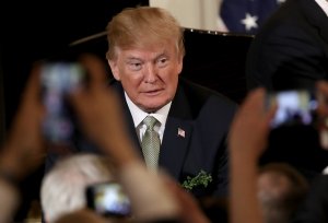 President Donald Trump greets supporters at the White House following an event with Irish Prime Minister Leo Varadkar, March 15, 2018. (Credit: Win McNamee / Getty Images)