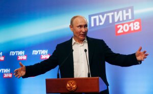 Vladimir Putin meets with the media at his campaign headquarters in Moscow on March 18, 2018. (Credit: Sergei Chirikov/AFP/Getty Images)