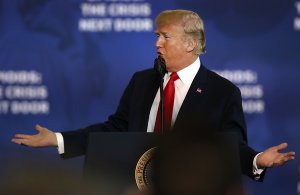 President Donald Trump speaks to supporters, local politicians and police officers at an event at Manchester Community College in New Hampshire on March 19, 2018. (Credit: Spencer Platt / Getty Images)