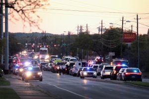 Police respond after one person was injured by a package containing an incendiary device at a nearby Goodwill store on March 20, 2018 in Austin, Texas. (Credit: Scott Olson/Getty Images)