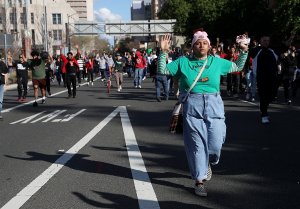 Black Lives Matter protesters march with their hands up during a demonstration on March 23, 2018, in Sacramento. (Credit: Justin Sullivan / Getty Images)