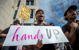 Black Lives Matter protesters march for Stephon Clark on the day of his funeral in downtown Sacramento on March 29, 2018. (Credit: JOSH EDELSON/AFP/Getty Images)