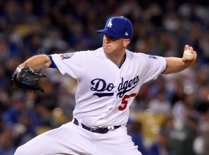 Alex Wood of the Los Angeles Dodgers pitches in the third inning of the game against the San Francisco Giants at Dodger Stadium on March 30, 2018. (Credit: Jayne Kamin-Oncea/Getty Images)