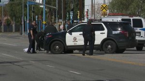 Police were investigating a hit-and-run crash that left a bicyclist dead in the downtown L.A. area on March 15, 2018. (Credit: KTLA)