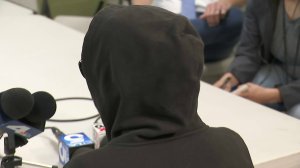 A woman LAPD identified as "Jane Doe" speaks to reporters on March 29, 2018. (Credit: KTLA)