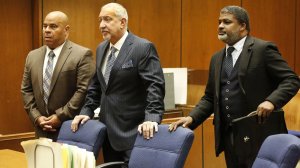 Attorney Matthew Fletcher, left, represented by Mark J. Geragos, center, and attorney Thaddeus Culpepper appear in court as they were indicted on charges of conspiring to bribe potential witnesses in the pending murder case of former rap mogul Marion "Suge" Knight. (Credit: Al Seib / Los Angeles Times)