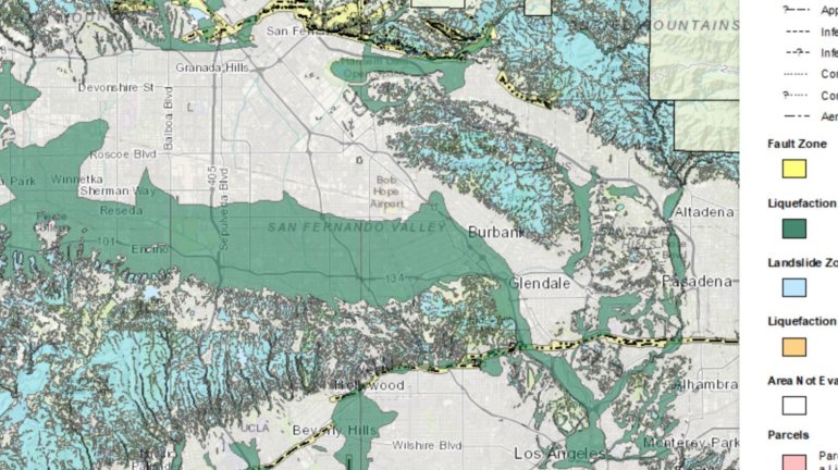 The southern half of the San Fernando Valley, which neighbors the Los Angeles River, is a large liquefaction zone, shown in green. Many mountainous and hilly areas, such as the Santa Monica Mountains, are at risk of earthquake-induced landslides, shown in aqua. (Credit: California Geological Survey)