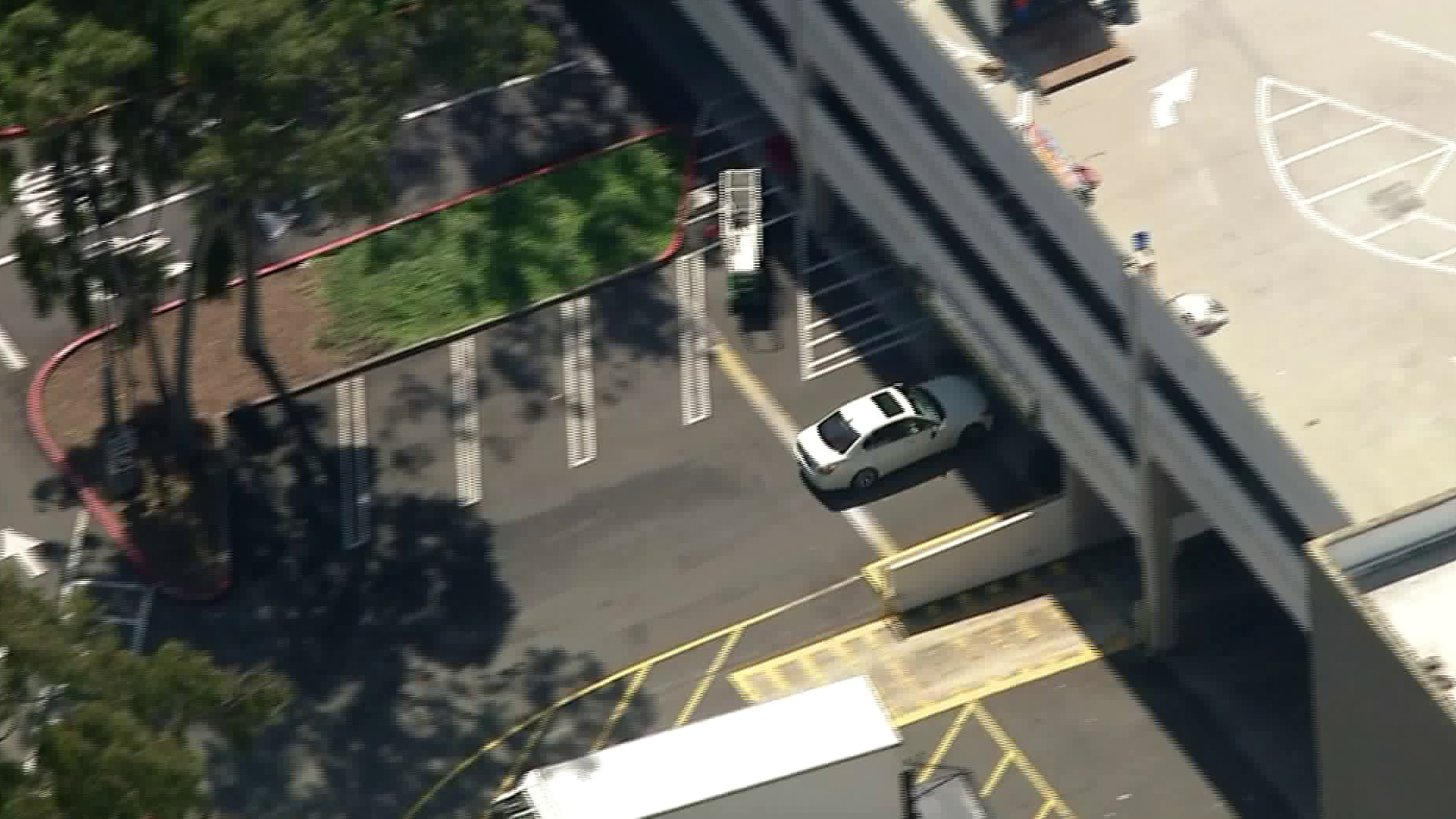 A driver who led police on a pursuit from the San Fernando Valley to West L.A. drives into the parking structure of the Westfield Culver City shopping mall on March 23, 2018. (Credit: KTLA)