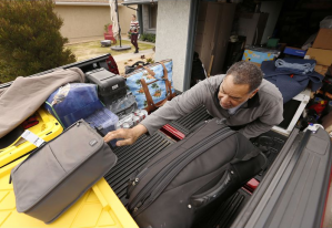 Browning Allen packs up his truck to leave the mandatory evacuation zone in Carpinteria, as a storm, forecast to be the biggest of the season, approaches on March 20, 2018. (Credit: Al Seib / Los Angeles Times)