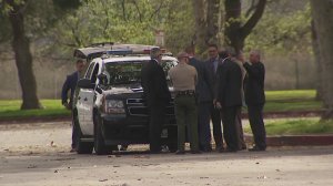 Officials convene at the scene of a deputy-involved shooting in South El Monte on March 18, 2018. (Credit: KTLA)