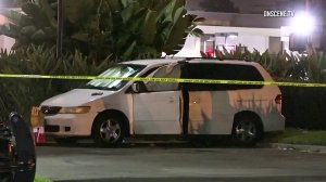 The bodies of four people were found inside a van in Garden Grove on March 16, 2018. (Credit: KTLA)