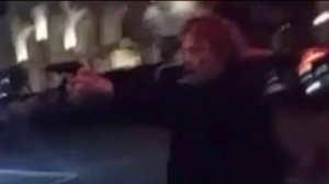 A still from a cellphone video provided to KTLA shows a man brandishing a firearm outside the Surfside bar in Venice.