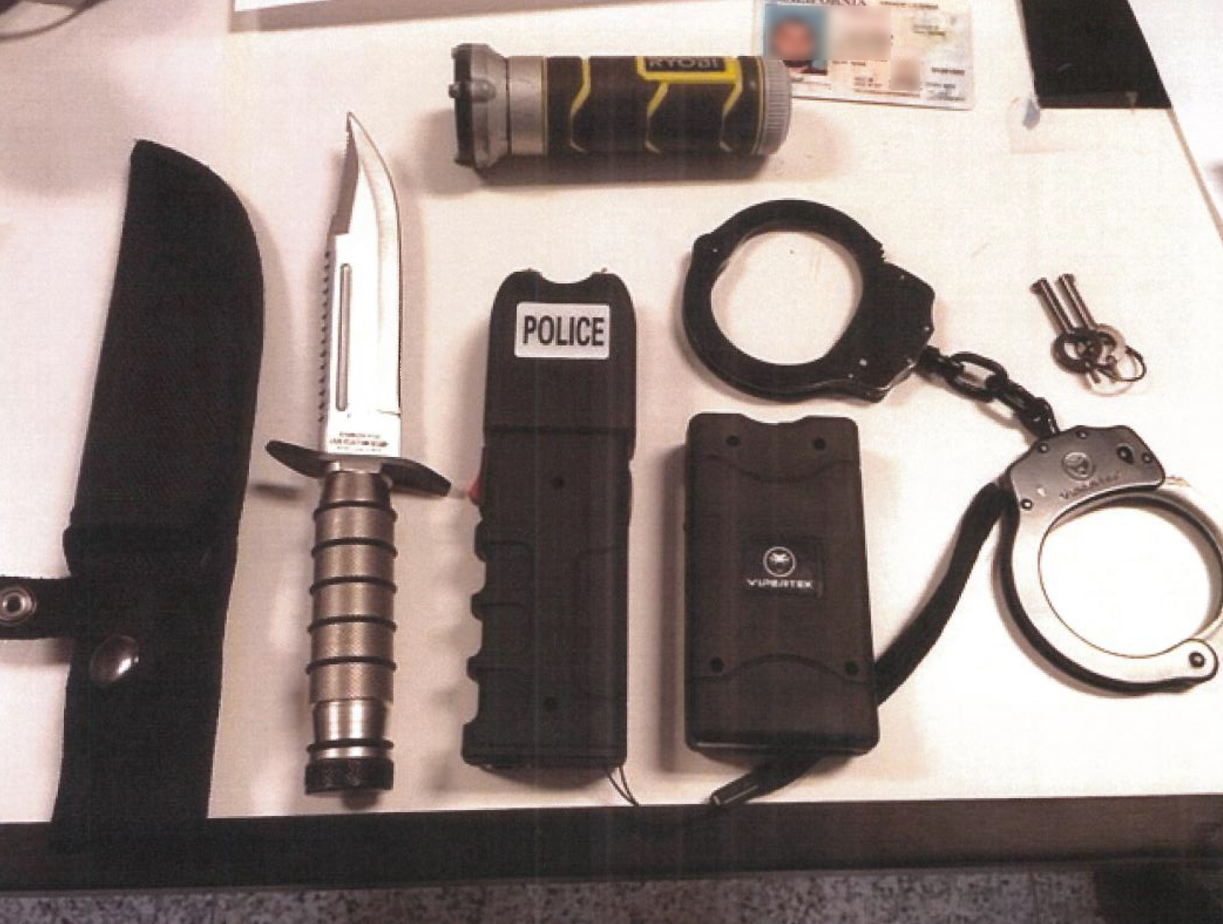 Weapons allegedly found on Greg Baghoomian are seen in an image provided by the L.A. County Sheriff's Department.