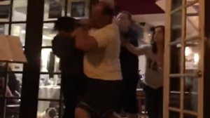 A video posted on YouTube shows a security guard throwing out a patron at a Newport Beach restaurant on April 13, 2018.