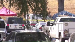 Investigators respond to a scene in Burbank where three bodies were found in a vehicle on April 17, 2018. (Credit: KTLA)