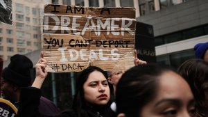 Demonstrators, many of them recent immigrants to America, protest the government shutdown and the lack of a deal on Deferred Action for Childhood Arrivals outside of Federal Plaza on Jan. 22, 2018, in New York City. (Credit: Spencer Platt/Getty Images)