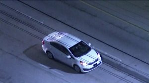 A vehicle being pursued by Los Angeles police is seen on the 405 Freeway on April 2, 2018. (Credit: KTLA)