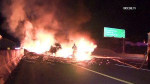 A big rig overturned on the 57 Freeway in the Fullerton area on April 17, 2018. (Credit: Onscene.tv/KTLA)