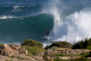 A surfer rides a wave at North Point on June 27, 2015 in Gracetown, Australia. (Credit: Paul Kane/Getty Images)