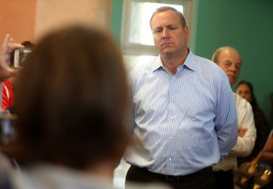 Rep. Jeff Denham, R-CA, right, listens to a constituent during a casual "Coffee and Conversation" at the Riverbank Teen Center on May 9, 2017 in Riverbank. (Credit: Justin Sullivan/Getty Images)