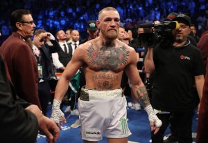 Conor McGregor stands in the ring after being defeated by Floyd Mayweather Jr. by TKO in the 10th round of their super welterweight boxing match on August 26, 2017 at T-Mobile Arena in Las Vegas, Nevada. (Credit: Christian Petersen/Getty Images)