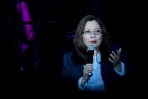 U.S. Senator Tammy Duckworth introduces Joe Walsh at the VetsAid Charity Benefit Concert at Eagle Bank Arena on Sept. 20, 2017 in Fairfax, Virginia. (Credit: Shannon Finney/Getty Images)