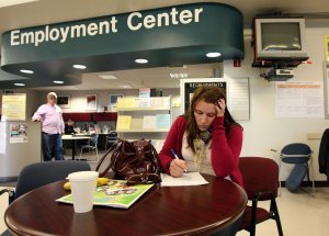 A woman fills out paperwork at an employment center in this file photo. (Credit: KTLA)