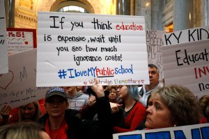 Public school teachers and their supporters protest against a pension reform bill outside the senate chambers at the Kentucky State Capitol April 2, 2018 in Frankfort, Kentucky. (Credit: Bill Pugliano/Getty Images)