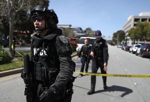 Law enforcement stands watch outside of the YouTube headquarters on April 3, 2018 in San Bruno. (Credit: Justin Sullivan/Getty Images)