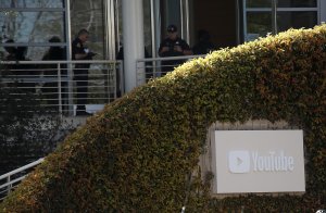 Police officers stand by in front of the YouTube headquarters on April 3, 2018 in San Bruno. (Credit: Justin Sullivan/Getty Images)