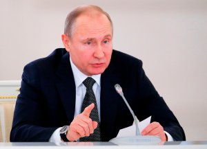 Russian President Vladimir Putin speaKS during a meeting of the State Council at the Kremlin in Moscow on April 5, 2018. (Credit: ALEXANDER ZEMLIANICHENKO/AFP/Getty Images)