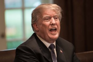 Donald Trump speaks during a meeting with senior military leaders at the White House on April 9, 2018. (Credit: Nicholas Kamm/AFP/Getty Images)