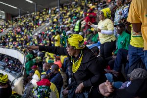 Crowds gather for the funeral of Winnie Mandela at the Orland Stadium on April 14, 2018, in Soweto, South Africa. (Credit: Charlie Shoemaker/Getty Images)