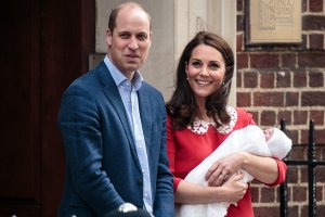 Prince William, Duke of Cambridge and Catherine, Duchess of Cambridge, pose for photographers with their newborn baby boy outside the Lindo Wing of St Mary's Hospital on April 23, 2018 in London. (Credit: Jack Taylor/Getty Images)