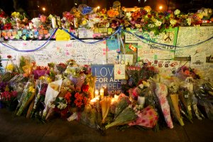 Flowers, cards, and words of sympathy adorn a makeshift memorial for victims of the mass killing on April 24, 2018 in Toronto, Canada. (Credit: Cole Burston/Getty Images)