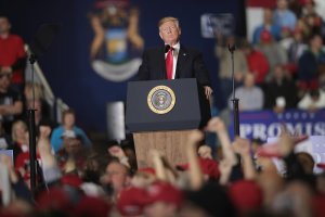 Donald Trump speaks to supporters during a campaign rally on April 28, 2018 in Washington, Michigan. (Credit: Scott Olson/Getty Images)