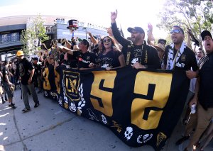 Fans gather at the Banc of California Stadium in Exposition Park before the inaugural home match of Los Angeles Football Club against the Seattle Sounders on April 29, 2018. (Credit: Harry How/Getty Images)