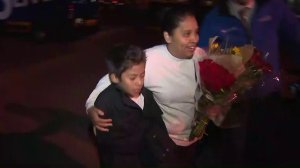 Marcelina Rios, of Ontario, embraces her son as she leave Adelanto Detention Facility after being imprisoned for six months, April 12, 2018. (Credit: KTLA)
