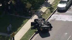 A vehicle is seen flipped over following a collision in North Hills on April 20, 2018. (Credit: KTLA)