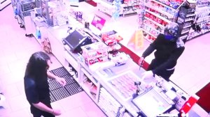 An armed robber at a Cypress 7-Eleven is seen in a surveillance image provided on April 25, 2018. 