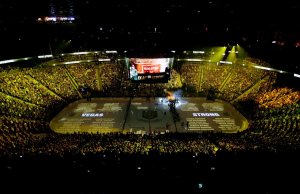 The names of people killed during the mass shooting in Las Vegas last year are projected on the ice during a ceremony before an NHL hockey game between the Vegas Golden Knights and the San Jose Sharks on Saturday in Las Vegas. (Credit: John Loocher/AP)